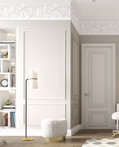 a living room with white furniture and walls painted in pale colors, including bookshelves