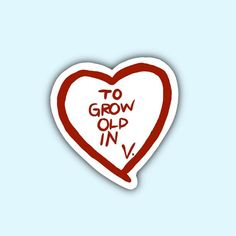 a heart shaped sticker with the words to grow old in v written on it