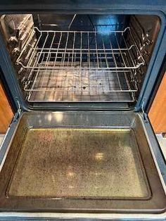 an oven with the door open and it is empty