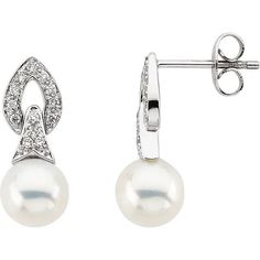 An antique 14K white gold setting with a contemporary design make these elegant pearl and diamond drop earrings a must-have. With 7mm freshwater cultured pearls and 0.16 carats in diamonds, glitter and shine day or night. Product Details 7mm Freshwater Cultured pearls 14K white gold 0.16 TCW in diamonds H-I color I1 clarity. friction backs Pearl Diamond Dangle Earrings, White Gold Set, Pearl And Diamond Earrings, Diamond Dangle Earrings, White Freshwater Pearl, Pearl Types, Diamond Drops, Freshwater Cultured Pearls, Pearl Diamond