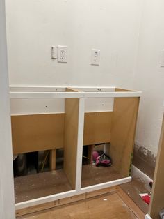 the inside of a room that is being built with plywood and wood flooring