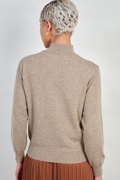 - Fit: True to size- Materials: 60% wool, 20% alpaca, 20% nylon- Thickness: Moderate- Sheerness: None- Stretch: None- Lining: None- Care: Dry clean or hand wash cold and dry in shade High Neck Cashmere Sweater In Fine Knit, High Neck Cashmere Sweater With Ribbed Collar, Casual Wool Fine Knit Turtleneck, High Neck Cashmere Sweater For Work, Casual Fine Knit Wool Turtleneck, High Neck Wool Sweater For Work, Cashmere High Neck Top With Ribbed Collar, High Neck Cashmere Sweater For Fall, High Neck Cashmere Top With Ribbed Collar