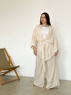 "🌿Women's Linen kimono set with blouse and high waisted wide leg pants. The belt fixes the waist well, and the pockets are made for your comfort and convenience.  Loose and roomy fit creates comfort, while soft linen fabric soothes the skin.  MORE: https://www.etsy.com/shop/ArtVyshyvankaUA?ref=seller-platform-mcnav&section_id=38397051 🌿DETAILS: - linen - High quality -Wide sleeves - Linen fabric gets softer with use, ages beautifully over time. 🌿Model is 167 cm (5ft 5.75in)  🌿CARE: machine w Wide Linen Pants, Kimono Set, Linen Kimono, High Waisted Wide Leg Pants, Summer Kimono, Linen Summer, Kimono Sleeves, Folk Fashion, Aging Beautifully