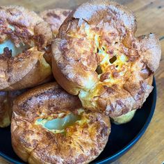 a plate filled with baked goods on top of a wooden table