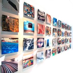 a wall with many different pictures on it