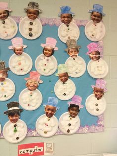 a bulletin board with snowmen on it in the shape of faces and hats for children to make