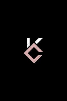 the letter k is made up of pink and white letters on black background, with an arrow