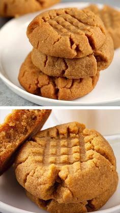 peanut butter cookies stacked on top of each other in two separate white plates with one cookie cut in half