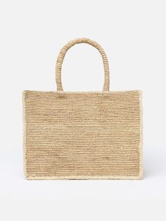 Introducing the Colette Raffia Handbag, a stunning accessory that captures the essence of natural beauty. Crafted entirely from authentic raffia, this handbag exudes a rustic charm and eco-friendly appeal. The Colette Raffia Handbag boasts a unique texture and intricate detailing, showcasing the natural fibers of the raffia material. Its design is characterized by a harmonious blend of earthy tones and a laid-back yet elegant aesthetic. The spacious interior of the handbag makes it perfect for carrying your daily essentials with ease. The durable and lightweight nature of the raffia material ensures both functionality and style, making it an ideal choice for various occasions. Embrace the beauty of nature with the Colette Raffia Handbag, where the authenticity of natural raffia meets a con Luxury Natural Crochet Bag For Shopping, Beige Straw Bag With Top Carry Handle, Luxury Beige Crochet Bag With Top Handle, Luxury Rectangular Straw Bags, Luxury Natural Beach Bag, Luxury Straw Shoulder Bag In Rectangular Shape, Luxury Handwoven Straw Bag With Double Handle, Luxury Rectangular Straw Shoulder Bag, Luxury Beige Crochet Tote Bag