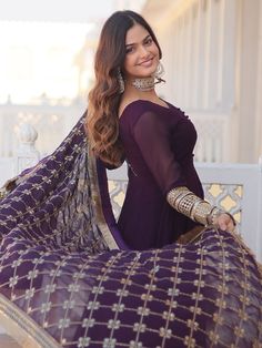 Introducing our stunning purple georgette function wear gown with a heavy dupatta, the perfect pick for your next event or special occasion. This fully stitched gown is available in sizes XS to XXL, with a 4-meter flair and a gown length of 56 inches. The gown features intricate sequin work and embroidered details, giving it a touch of elegance and sophistication.
The similar color georgette dupatta complements the gown beautifully, with sequin embroidered work and a designer lace border. The 2. Purple Floor-length Churidar With Resham Embroidery, Purple Resham Embroidered Floor-length Churidar, Purple Resham Embroidery Floor-length Churidar, Traditional Purple Gown With Sheer Dupatta, Elegant Purple Gown With Sheer Dupatta, Purple Anarkali Gown With Resham Embroidery, Semi-stitched Purple Churidar For Wedding, Semi-stitched Purple Gown With Sheer Dupatta, Purple Semi-stitched Anarkali Gown