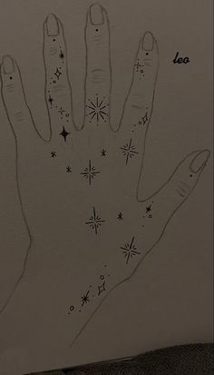 a drawing of a hand with stars on it