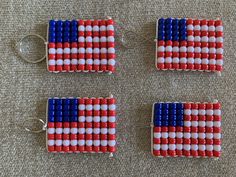 three red, white and blue beads are arranged in the shape of an american flag