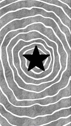 a black and white image of a star in the middle of a circular pattern with wavy lines