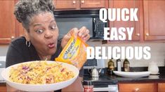 a woman holding a bag of noodles in front of her face with the words quick easy delicious