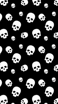 many white skulls on black background