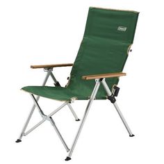 a green camping chair sitting on top of a white floor