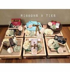 there are many boxes with items in them on the floor next to a sign that says ribbons & ties