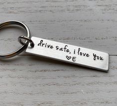 a keychain that says drive safe, i love you