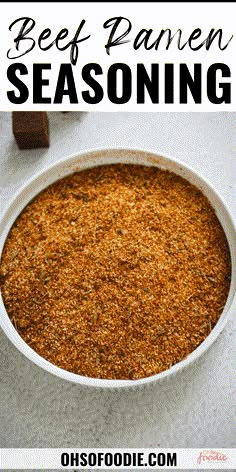 a bowl filled with beef parmesan seasoning on top of a white counter