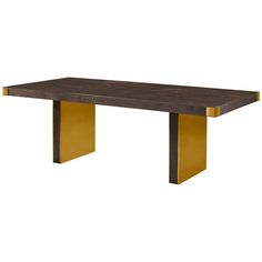 a wooden table with gold legs on a white background