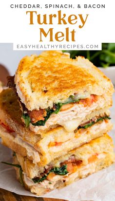 three grilled turkey melt sandwiches stacked on top of each other