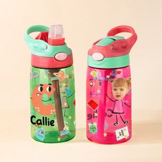 two children's water bottles sitting next to each other