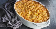 a casserole dish with macaroni and cheese in it on a table