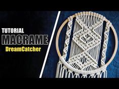 the macrame dream catcher is made with yarn