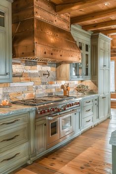 a kitchen with an oven, stove and counter tops in it's center island