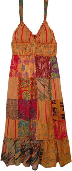 A boho chic hippi delicate cotton voile patchwork dress with orange-rust over dye. The bralette to style dress is obviously sleeveless and has elastic on the neck for a snug fit, and smocking elastic all over around the bust area. #tlb #Patchwork #Printed #bohemianfashion #patchworkdress Orange Sleeveless Patchwork Dress, Fitted Hippie Dress With Patchwork, Fitted Hippie Patchwork Dresses, Hippie Fitted Patchwork Dresses, Orange Bohemian Cotton Dress, Orange Cotton Patchwork Dress, Bohemian Brown Dress With Patchwork, Orange Hippie Summer Dresses, Fitted Orange Hippie Dress