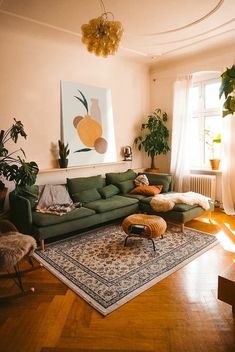 the living room is clean and ready for us to use it's natural light