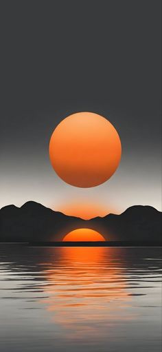 the sun is setting over water with mountains in the background and an orange circle above it