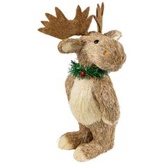 a stuffed moose with a wreath around its neck and antlers on it's back