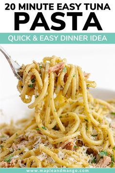 pasta with meat and parmesan cheese in a white bowl on top of a table