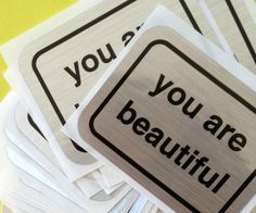 you are beautiful stickers stacked on top of each other