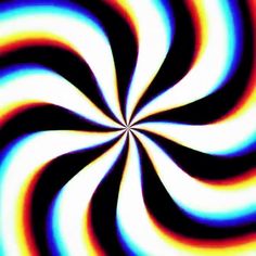 an image of a colorful spiral design that looks like it is going through the air