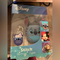 the stitch airpods case is in its packaging