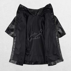 Add a chic and edgy touch to your wardrobe with our Women's Black Faux Leather Short-Sleeve Jacket. Designed for the modern woman who loves to stand out, this jacket offers a perfect blend of style and comfort. Made from high-quality faux leather, it delivers the sophisticated look of real leather without compromising on comfort or ethical values. Key Features: Premium Faux Leather: Crafted from high-quality faux leather, this jacket has a luxurious finish that mirrors the look and feel of genui Short Sleeve Leather Jacket, Classic Leather Jacket, Semi Formal Wear, Black Leather Shorts, Jacket With Zipper, Black Faux Leather Jacket, Short Sleeve Jacket, Leather Short, Leather Shorts