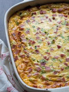 a casserole dish with ham and cheese in it