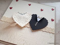 a close up of a greeting card with hearts