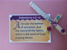 a cross with an ad for ephesians 69 - 19 on it and a card attached to it