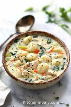 a close up of a bowl of food on a table