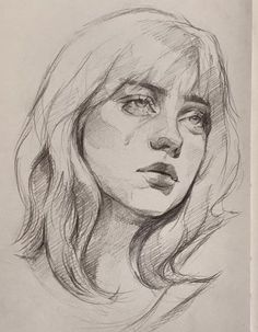 a pencil drawing of a woman's face