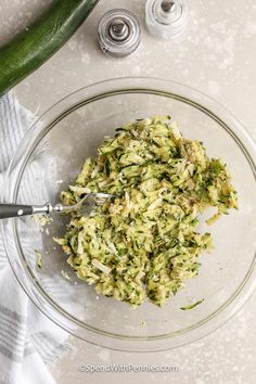 zucchini and pesto in a glass bowl