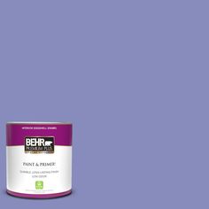 a can of paint on a pink background