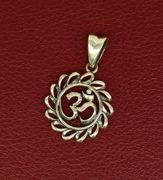 Indian Hindu Mantra Om Design vintage antique style stunning divine pendant, best gifting unisex jewelry from India. Metal-925 sterling silver. Item type-Pendant/ Locket Weight-2.660 grams. Height-3.3 centimeter. Width-2.1 centimeters. Stamped-925. Finish-Oxidized. note: chain is not included in this price, to purchase chain please visit the following links: https://www.etsy.com/listing/823425858/16-to-30-long-screw-chain-925-sterling?ref=listings_manager_grid Make excellent gifting and collecti Temple Jewelry Locket For Meditation, Spiritual Engraved Pendant Jewelry, Oxidized Pendant For Meditation, Symbolic Sterling Silver Jewelry For Meditation, Spiritual Oxidized Medallion Jewelry, Oxidized Finish Pendant For Meditation, Engraved Medallion Temple Jewelry, Silver Pendant Jewelry For Diwali, Spiritual Jewelry With Intricate Design For Diwali