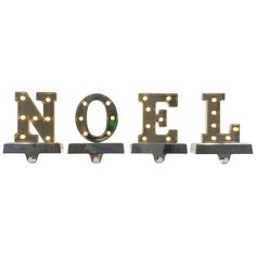 the word noel spelled out with lights on it's back end and two brackets