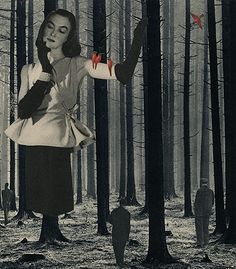 a woman standing in the middle of a forest