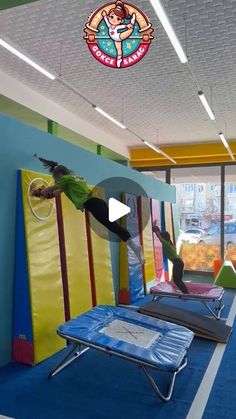 an indoor trampoline park with slides and bouncers for kids to play in