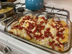 a casserole dish is sitting on the stove